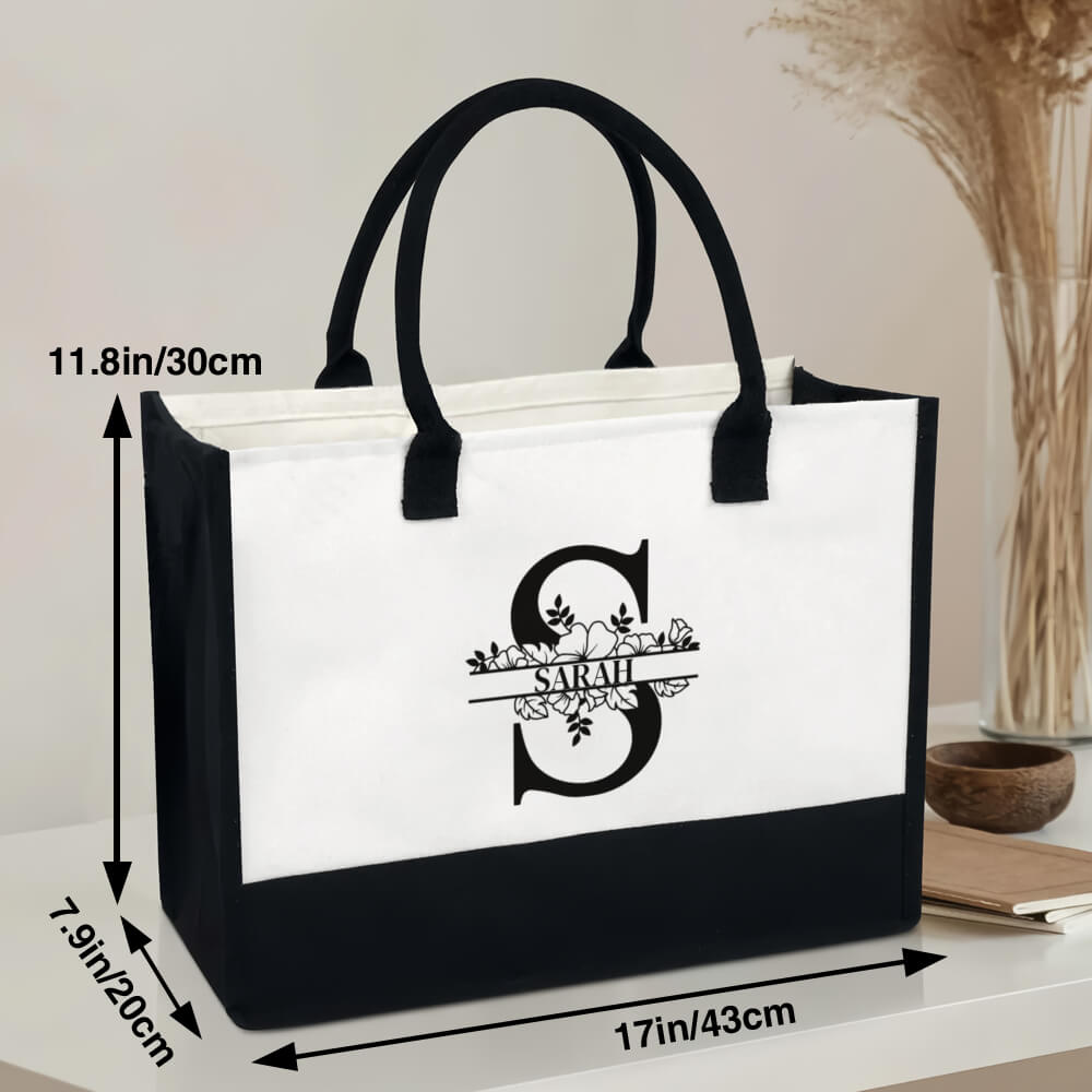 Personalized initial canvas tote bag in gift packaging, thoughtful custom gift idea