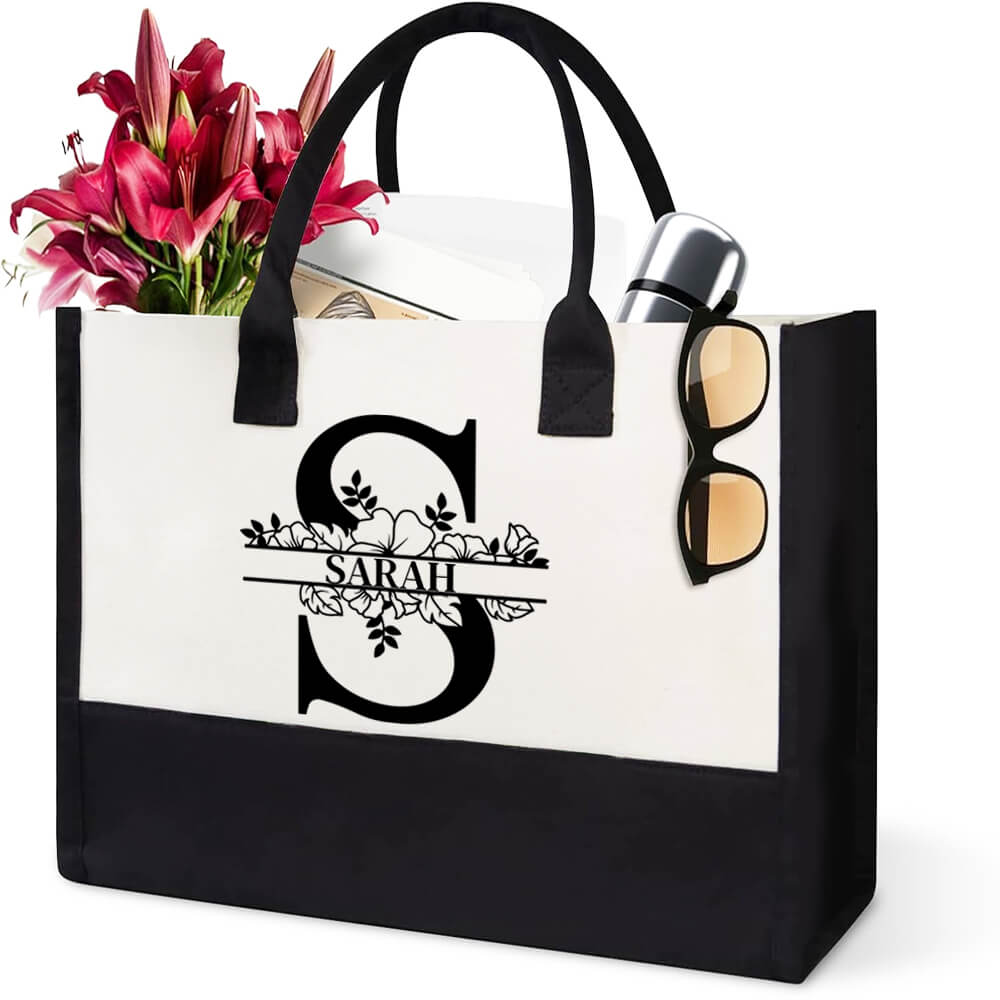 Personalized initial canvas tote bag in gift packaging, thoughtful custom gift idea