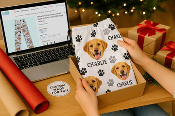 Person unboxing personalized pajama pants printed with dog’s face named Charlie, browsing Duconspace custom pet gifts website beside Christmas presents