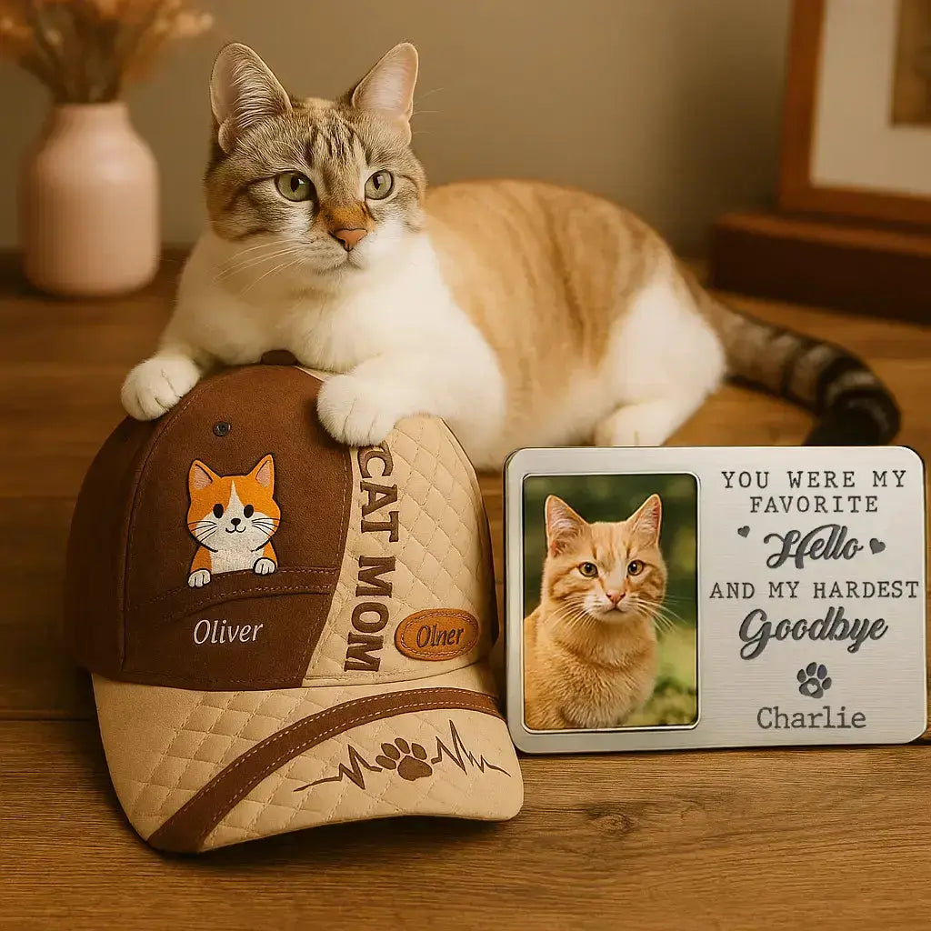 Elegant flatlay of cat-themed personalized gifts including cat mom hat, floral cat ornament, and custom sweatshirt