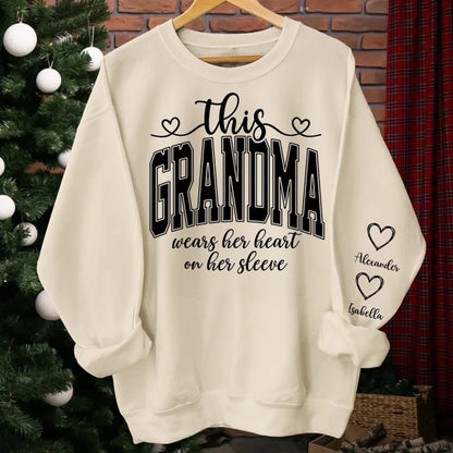 This Mom Wears Her Heart On Her Sleeve Sweatshirt – Personalized Gift for Moms with Kid’s Name