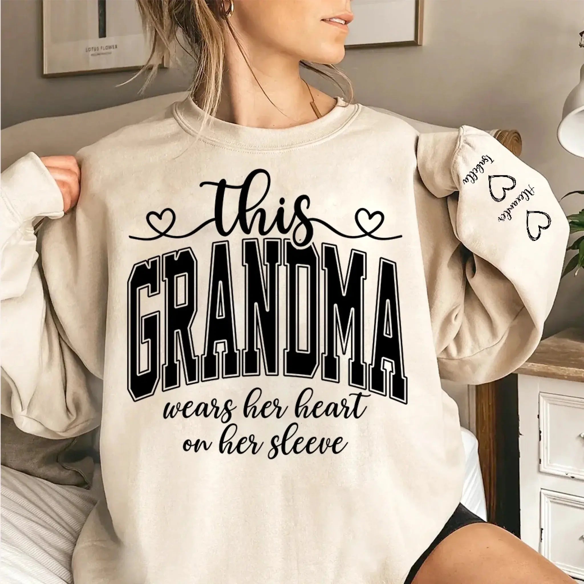 This Mom Wears Her Heart On Her Sleeve Sweatshirt – Personalized Gift for Moms with Kid’s Name