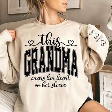 This Mom Wears Her Heart On Her Sleeve Sweatshirt – Personalized Gift for Moms with Kid’s Name
