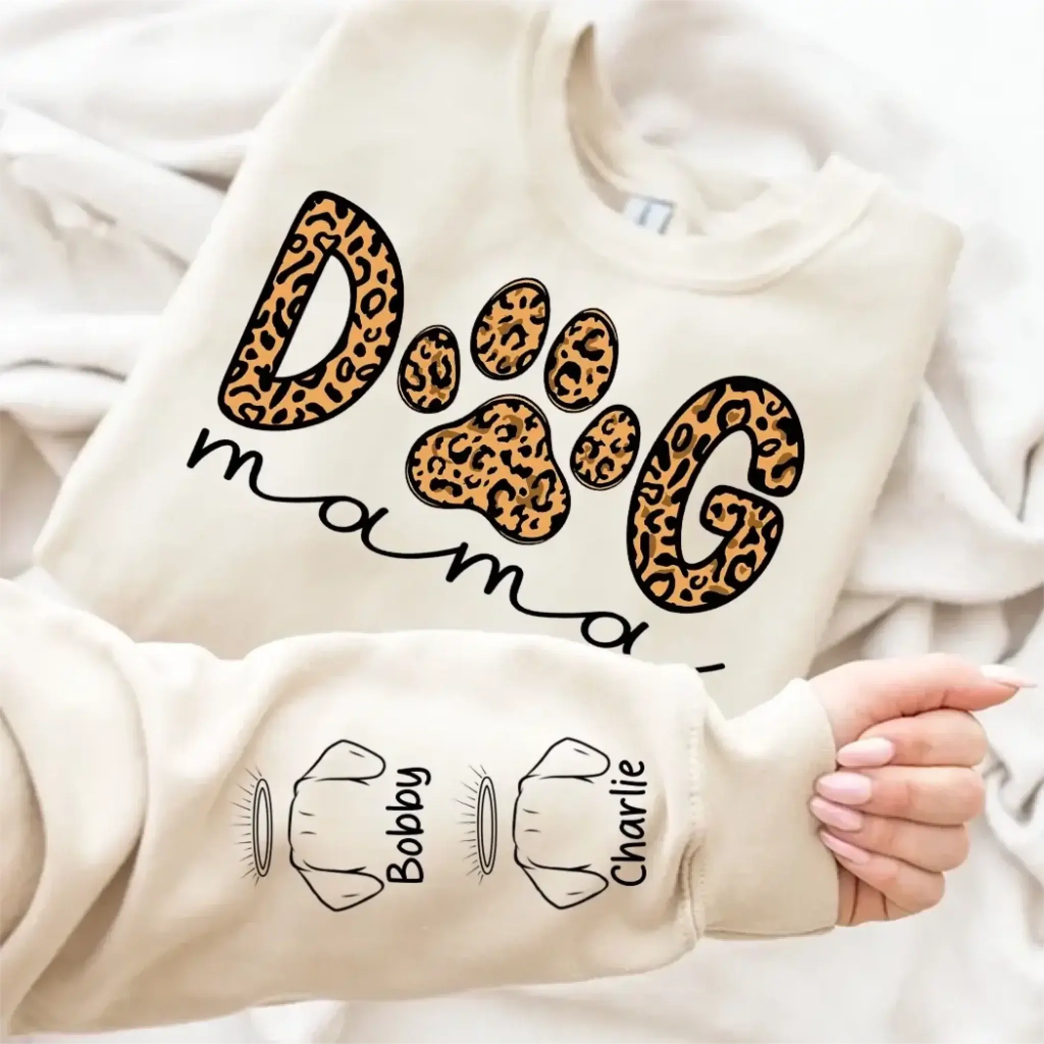 7. Dog Mama Leopard Paw Sweatshirt,Hoodie – Personalized Dog Names on Sleeves, Cute Gift for Dog Lovers