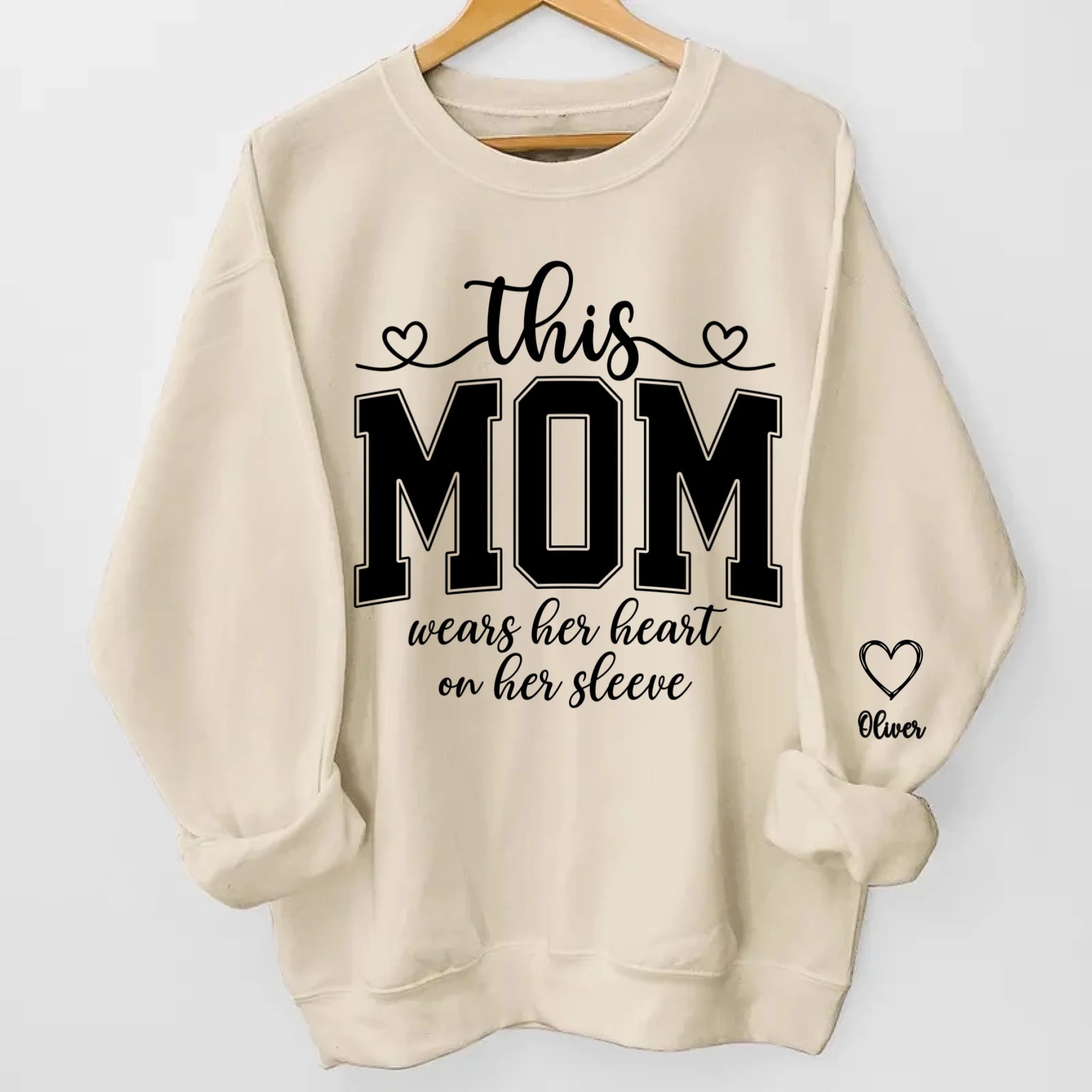 This Mom Wears Her Heart On Her Sleeve Sweatshirt – Personalized Gift for Moms with Kid’s Name