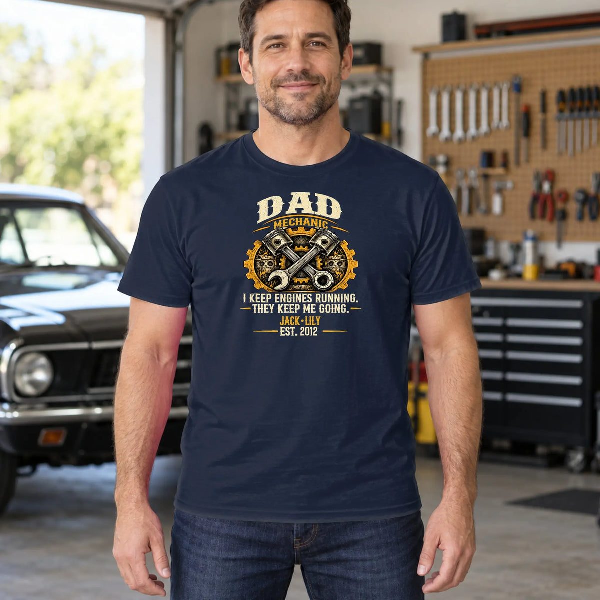 CDCT-OCT26-024_02-lifestyle - dad mechanic navy tee in the garage