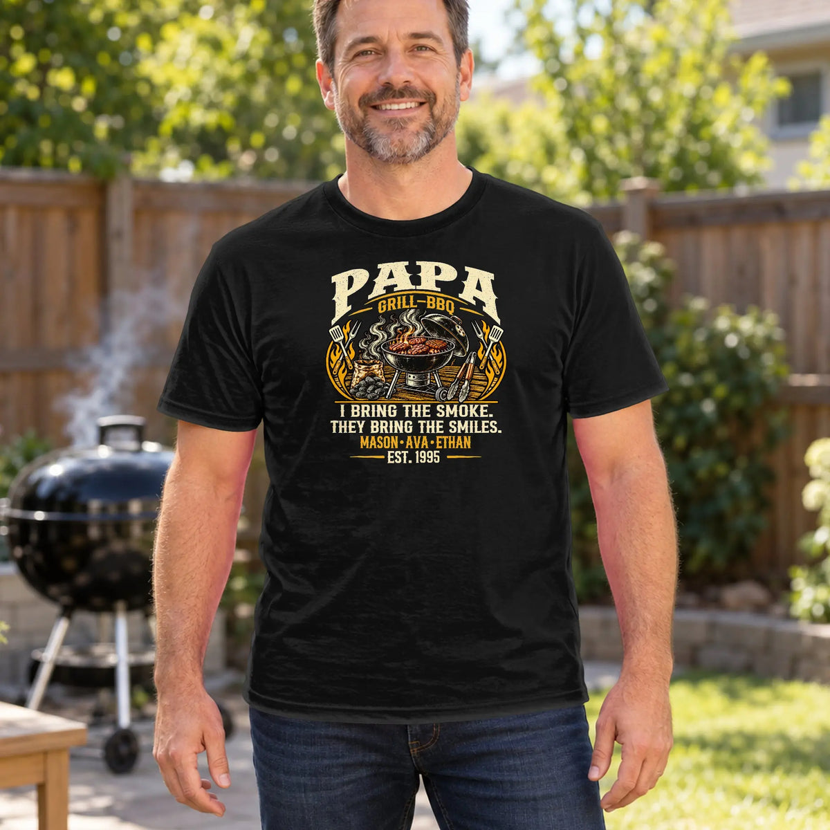 CDCT-OCT26-024_03-lifestyle - papa grill BBQ tee in the backyard