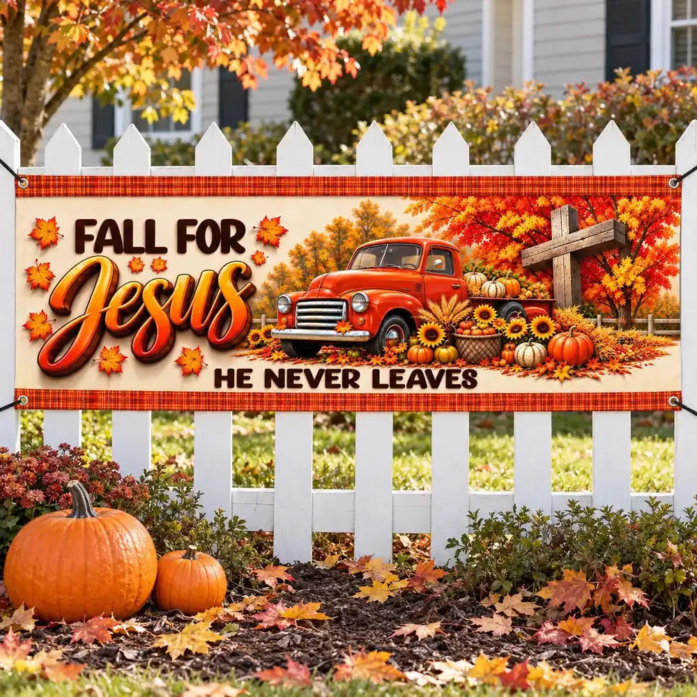 Fall For Jesus autumn banner hung on white picket fence