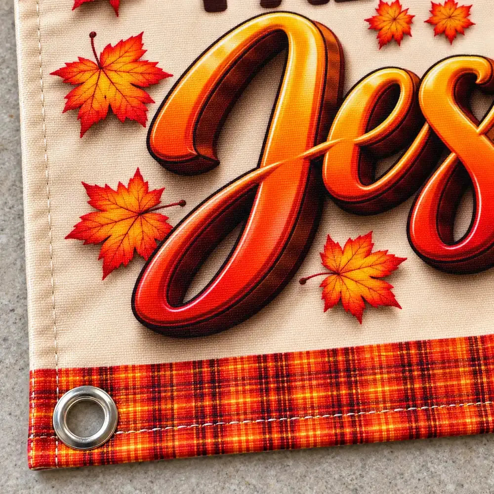 Fabric banner corner with metal grommet and hem detail