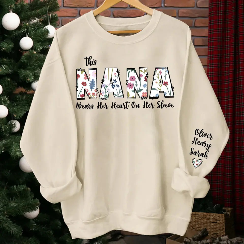 "This Nana Wears Her Heart on Her Sleeve" - Retro Boho Floral Sweatshirt & Hoodie, Mother’s Day Gift for Grandma