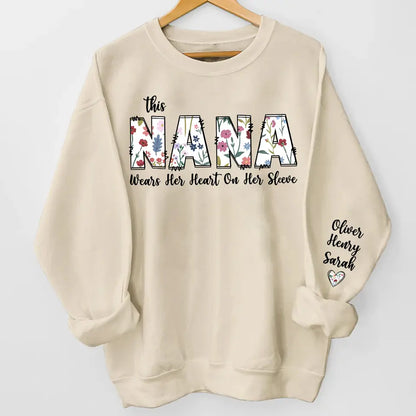 "This Nana Wears Her Heart on Her Sleeve" - Retro Boho Floral Sweatshirt & Hoodie, Mother’s Day Gift for Grandma