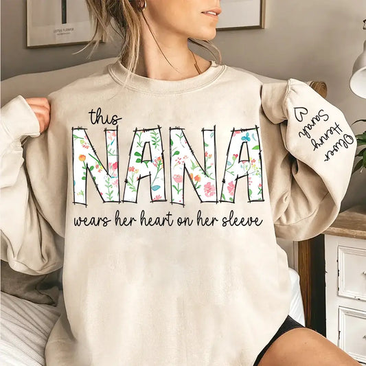 "This Nana Wears Her Heart on Her Sleeve" - Retro Boho Floral Sweatshirt & Hoodie, Personalized Mother’s Day Gift for Grandma