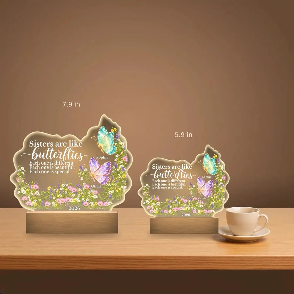 Size comparison 5.9 in and 7.9 in sisters night light