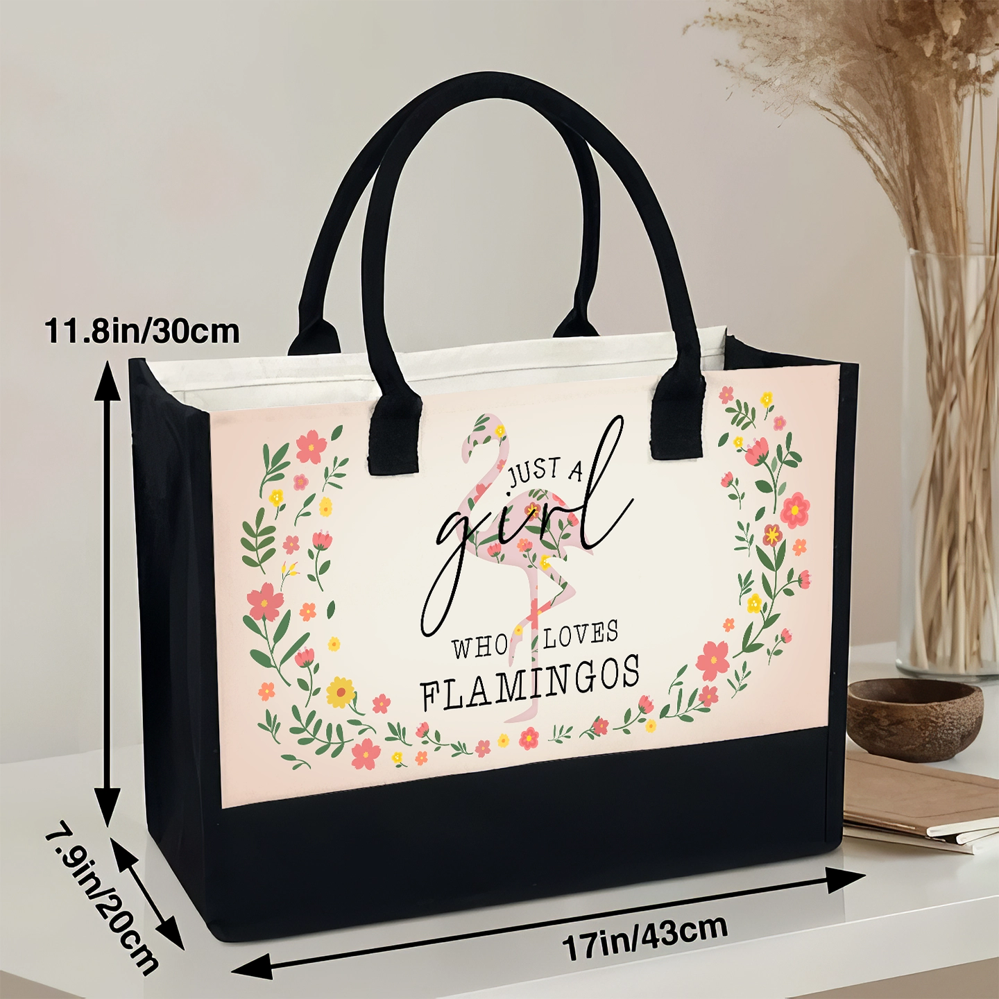 Model carrying 'Just A Girl Who Loves Flamingos' canvas tote bag in a casual setting
