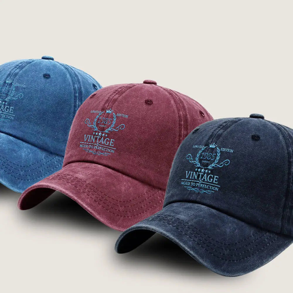 Close-up of printed text 'Aged to Perfection' on vintage denim hat