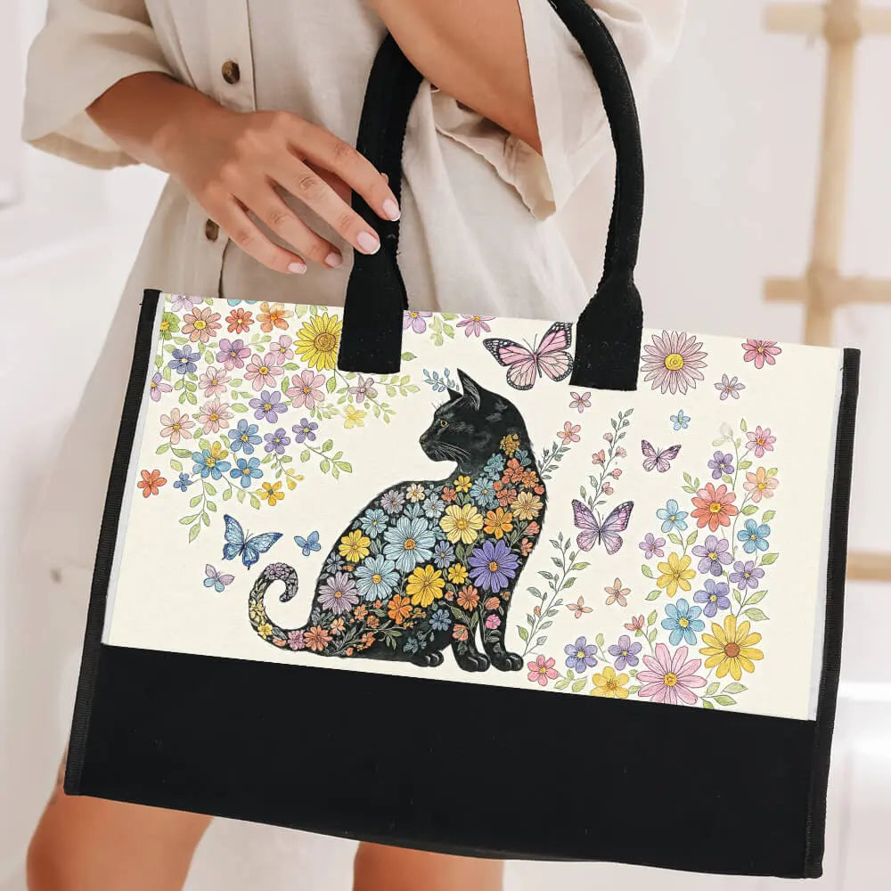Black cat canvas tote styled with casual outfit – elegant gift for women