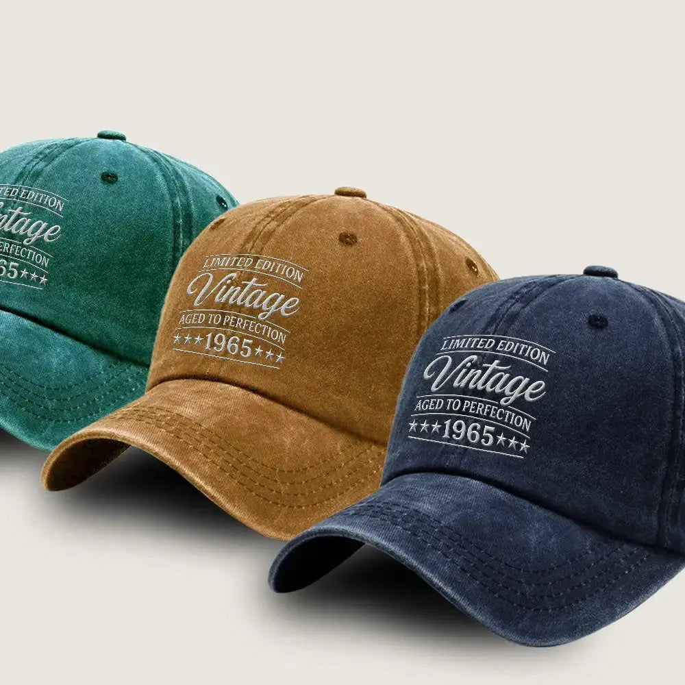 Three vintage-style baseball caps in teal, brown, and navy on a light gray background.